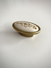 Dorezë (Doreza) për mobilie, ngjyrë ari-qumështi , L:0mm ”porcellana”